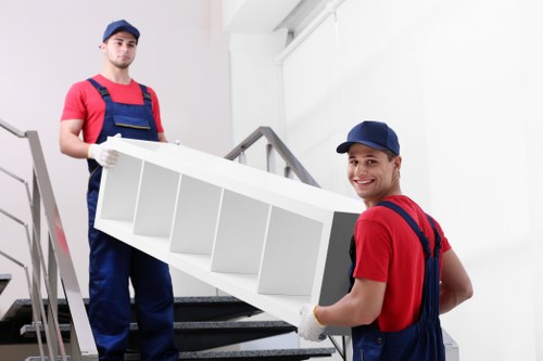 Careful handling of furniture during a house removal in Harlington