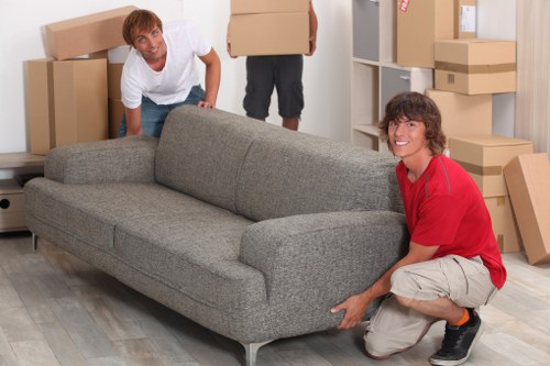 Packed boxes and furniture prepared for removal services in Harlington
