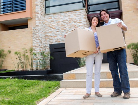 Professional man and van team in Harlington managing a local relocation