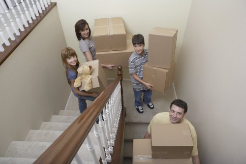 Packing and loading furniture into a moving truck for a Harlington move
